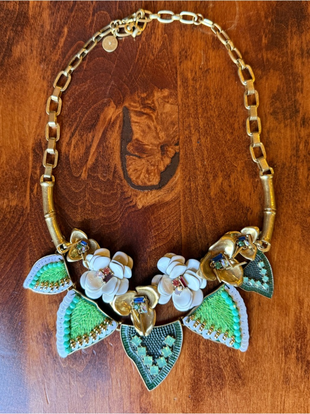 Stella & Dot Gold-Tone Necklace with White Flowers and Green Leaf Accents
